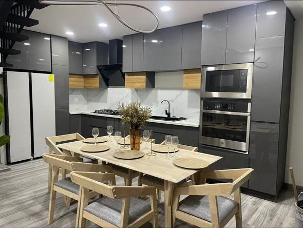 Cocina y comedor de áreas comunes · Hotel Silvias Inn